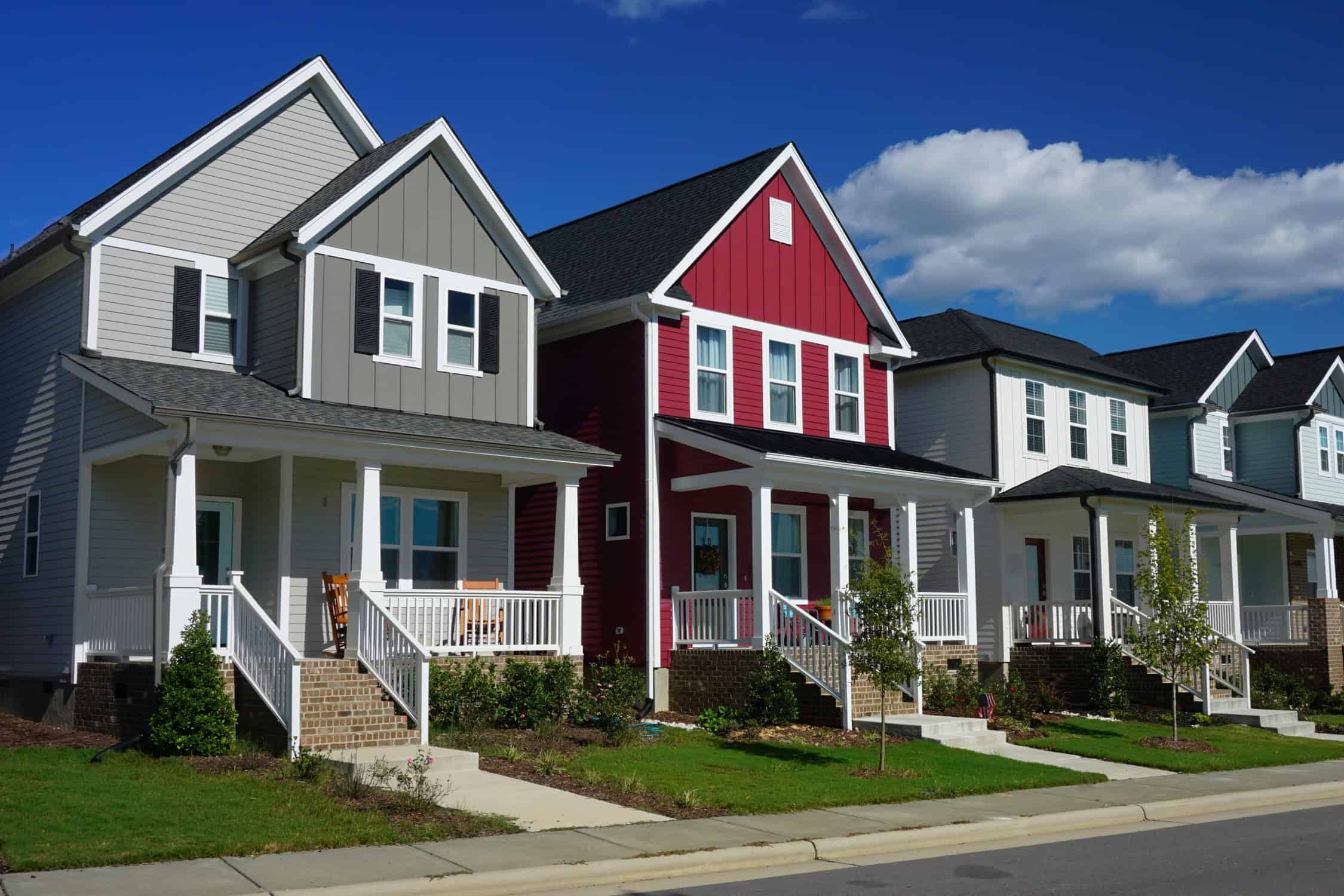 Red and Gray Row Houses in Suburbia Woodinville front porch with a coordinated paint color scheme