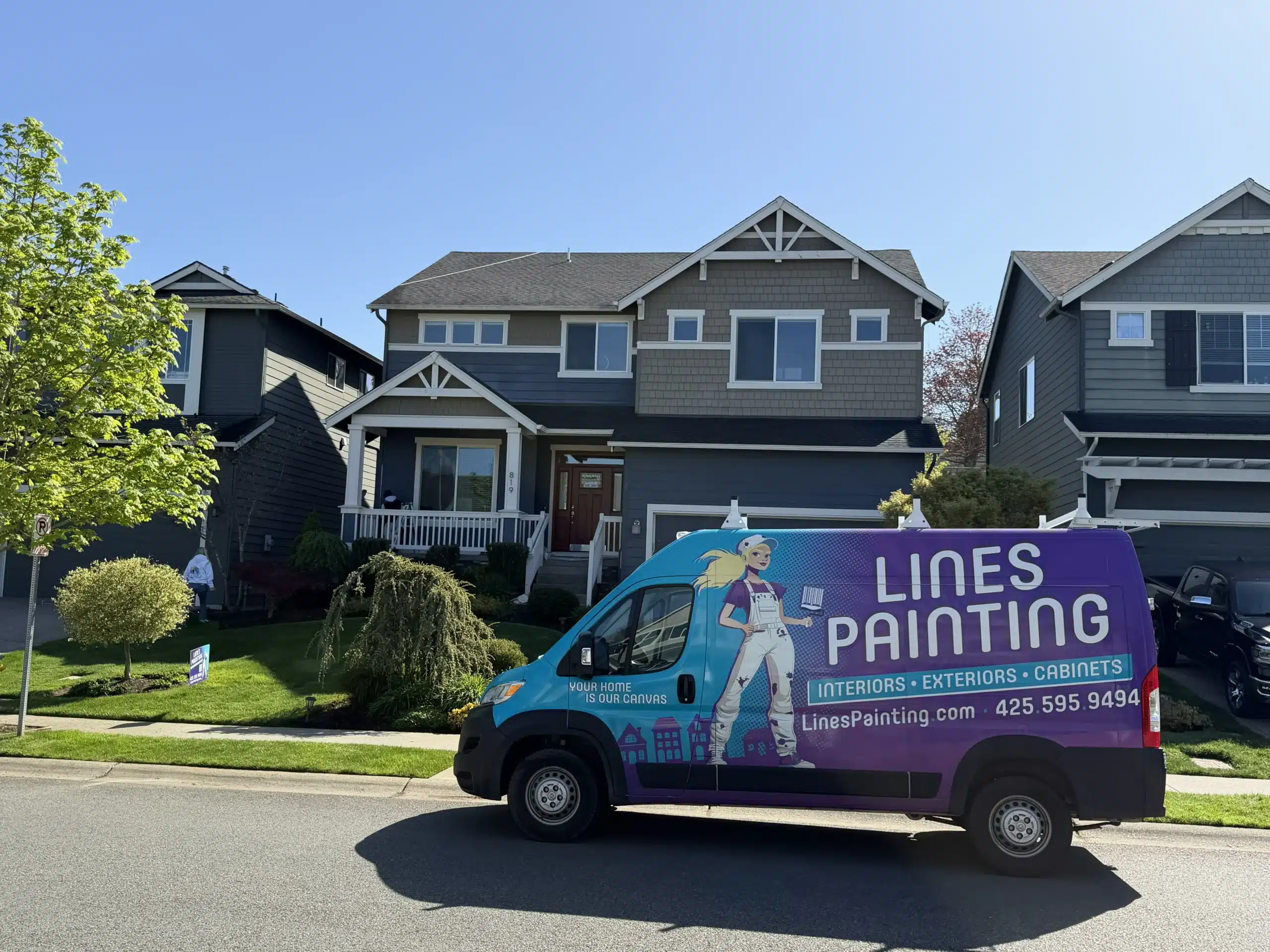 Lines Painting company van parked outside a suburban home best paint for gutters and fascia